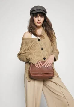 Arena - Cardigan 9 Arena - Cardigan -The LBD Shop 0c1e5749a96b449080a82c7e9e6ea5ab