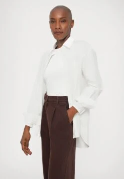 NANDA - Relaxed Fit Jeans - Cioccolato -The LBD Shop 5494b56c52784dc5bb6f3fb6d5ef817f