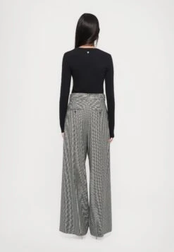 GLOBALE - Trousers - Nero 10 GLOBALE - Trousers - Nero -The LBD Shop 98dbf97093a2461e817624bcc1dbf7dc