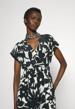 Dollaro - Jumpsuit -The LBD Shop ea4ba3ff2a0f4f7b91bf37ee015ee453